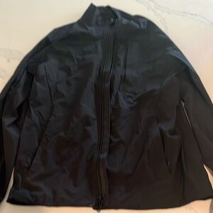 Men’s lululemon rain jacket, size large. Has company logo on front and side